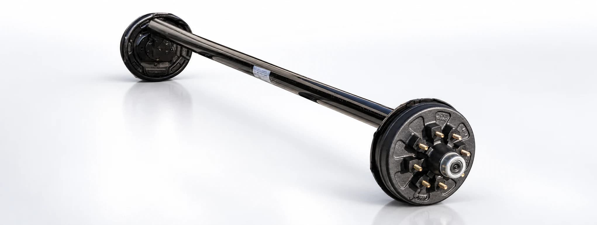 Drop trailer axle with brake assembly for RV and caravan trailer applications